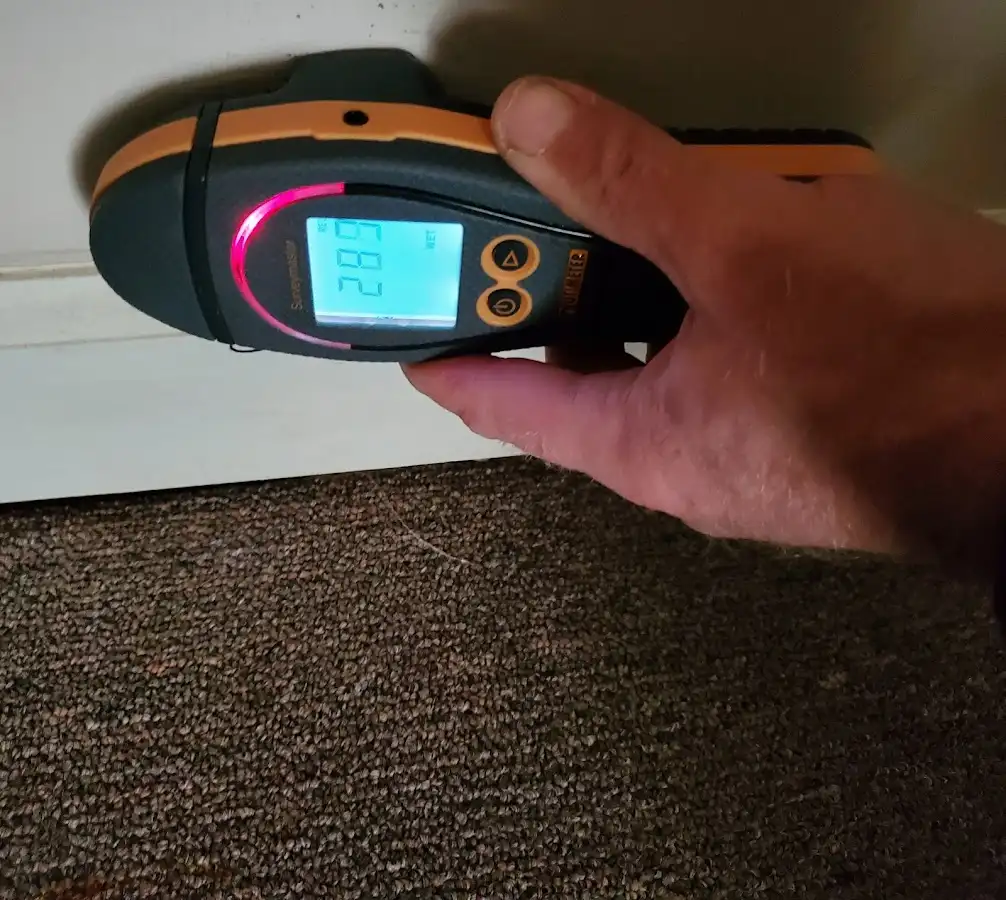 Moisture detection at baseboard during Sewage Cleanup & Sanitation in Country Club